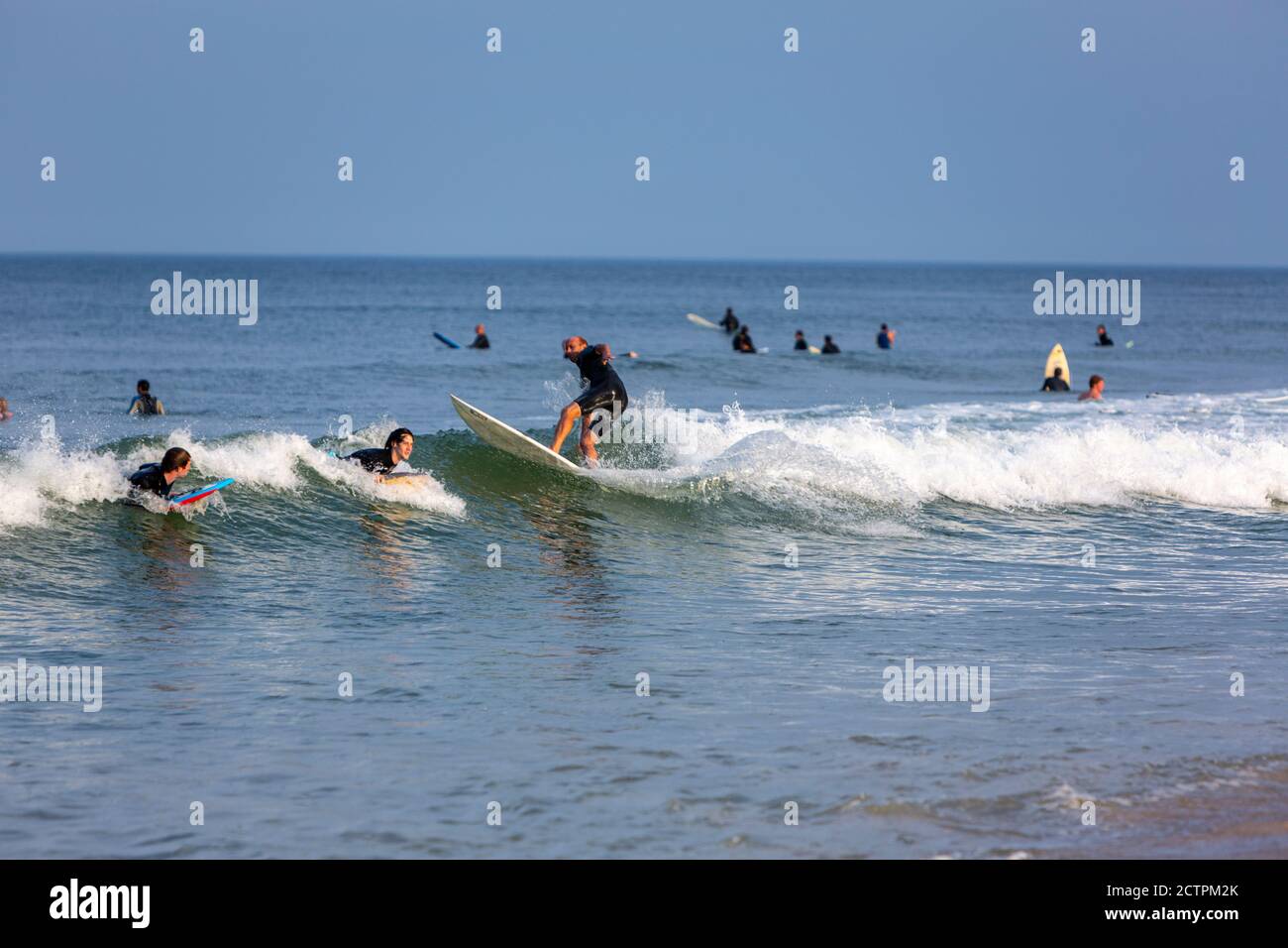 Surfers in Marconi Beach, Eastham, Cape Cod National Seashore, Massachusetts,  United States Stock Photo