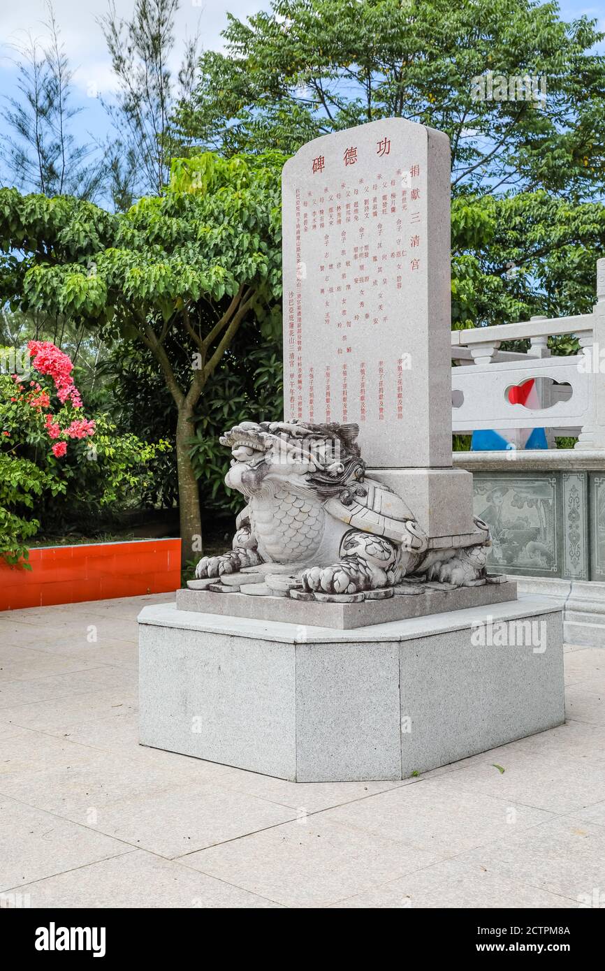 Inanam, Sabah, Malaysia:  A Bixi (a dragon with the shell of a turtle) in the temple compound of the Kota Kinabalu San Ching Taoism Association Stock Photo
