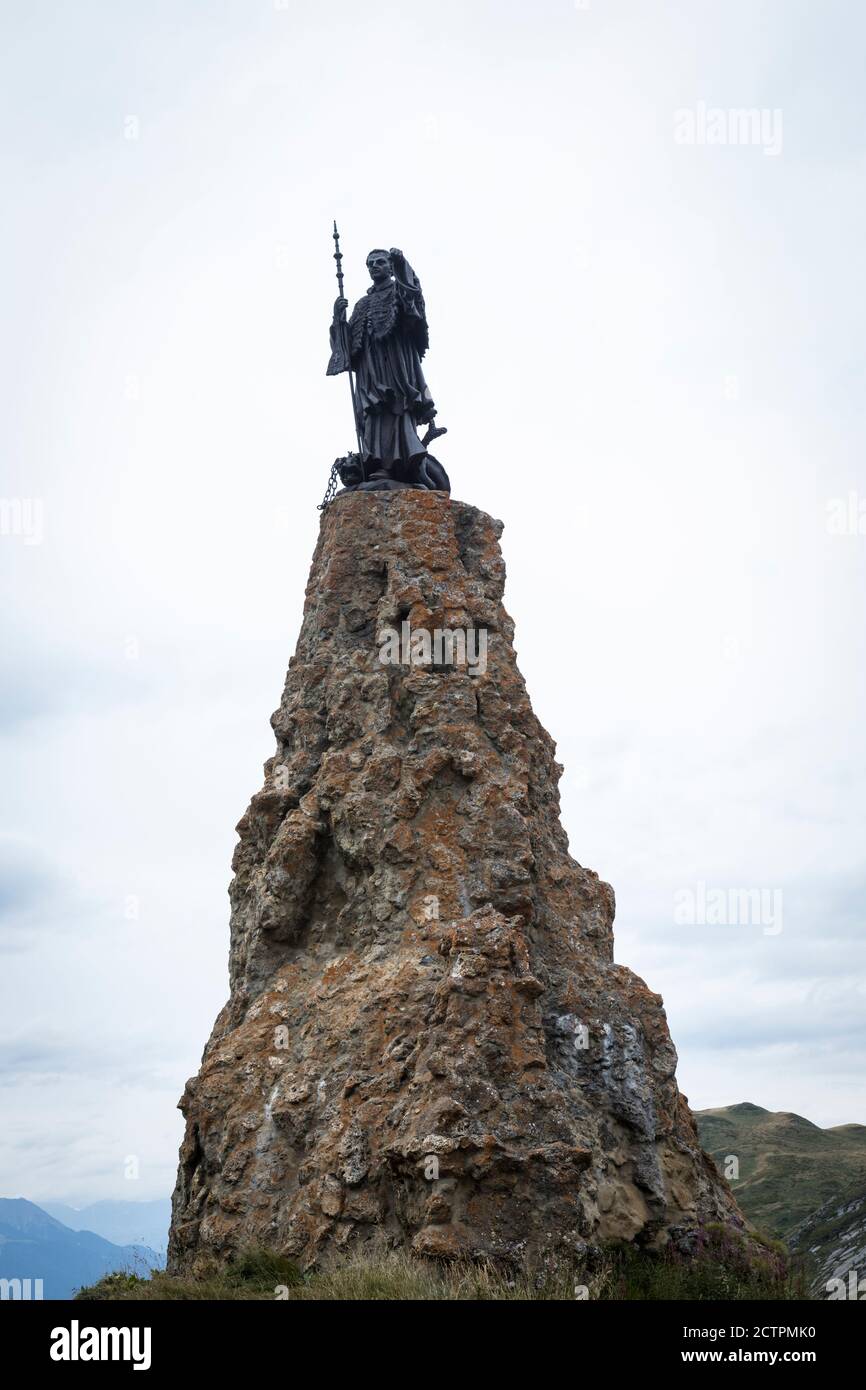 The statue of Saint Bernard at the summit of the Col du Petit Saint-Bernard (Little St Bernard Pass, Colle del Piccolo San Bernardo), Italy/France Stock Photo