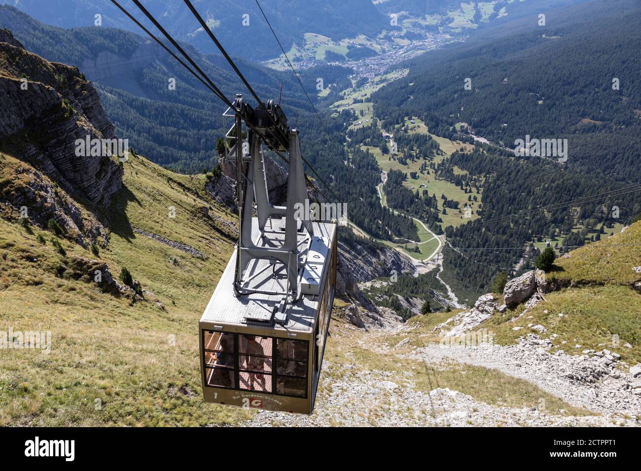 The Seceda cable car nears the top station with panoramic views beyond