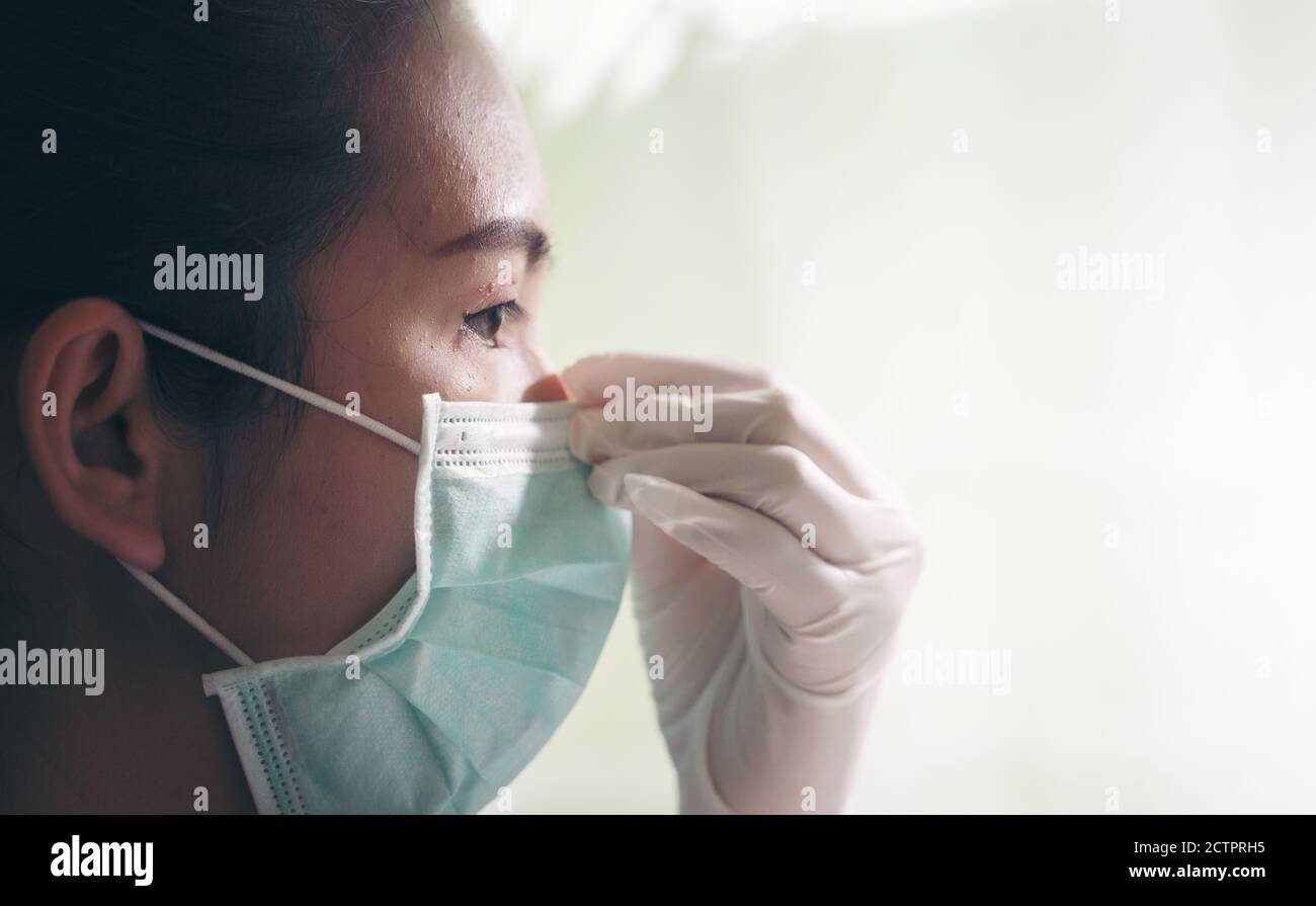 Women with safety mask from coronavirus. Covid-19 outbreak around the world Stock Photo