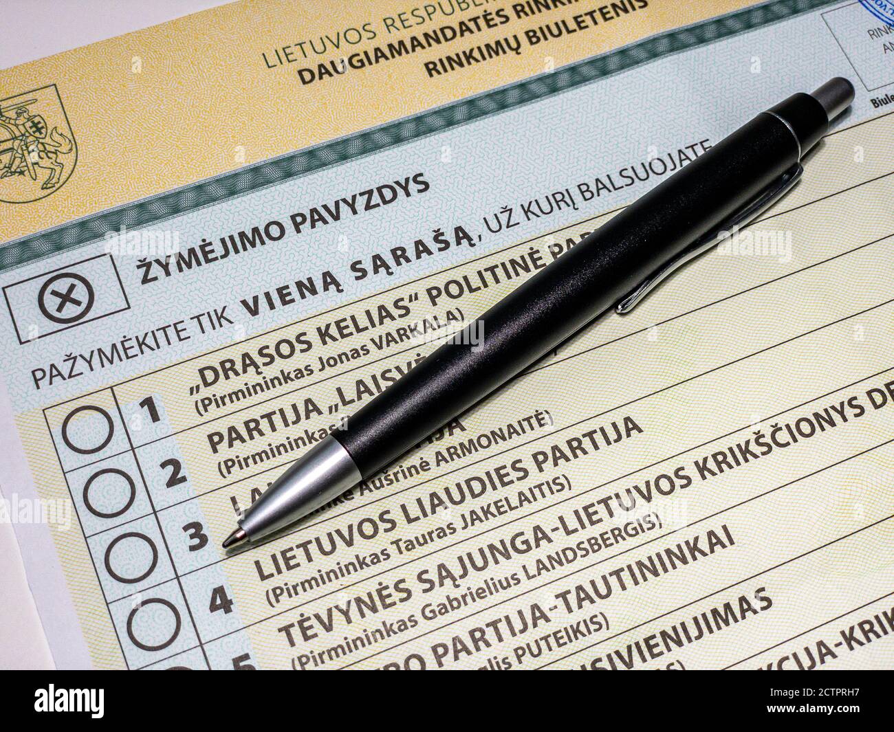 Close up voting ballot for for 2020 Lithuanian Seimas parliamentary elections with black pen Stock Photo