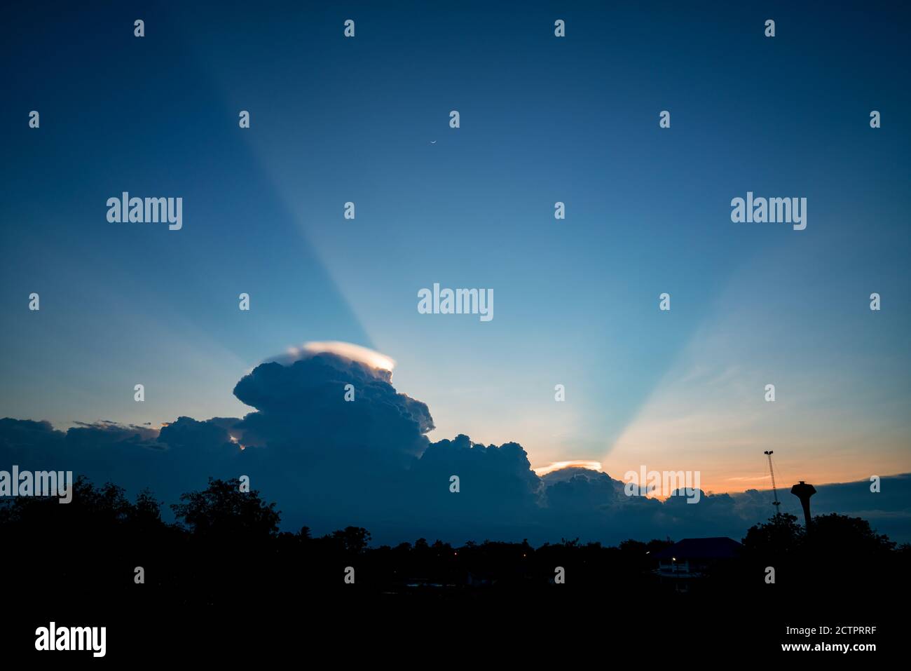 Light in the Dark and Dramatic Storm Clouds, sunset sky Stock Photo - Alamy