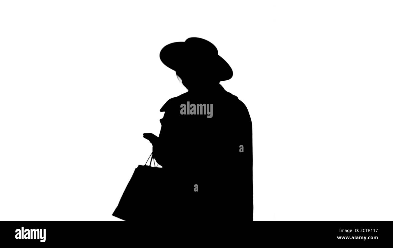Smiling African american fashion girl in coat and black hat text Stock Photo