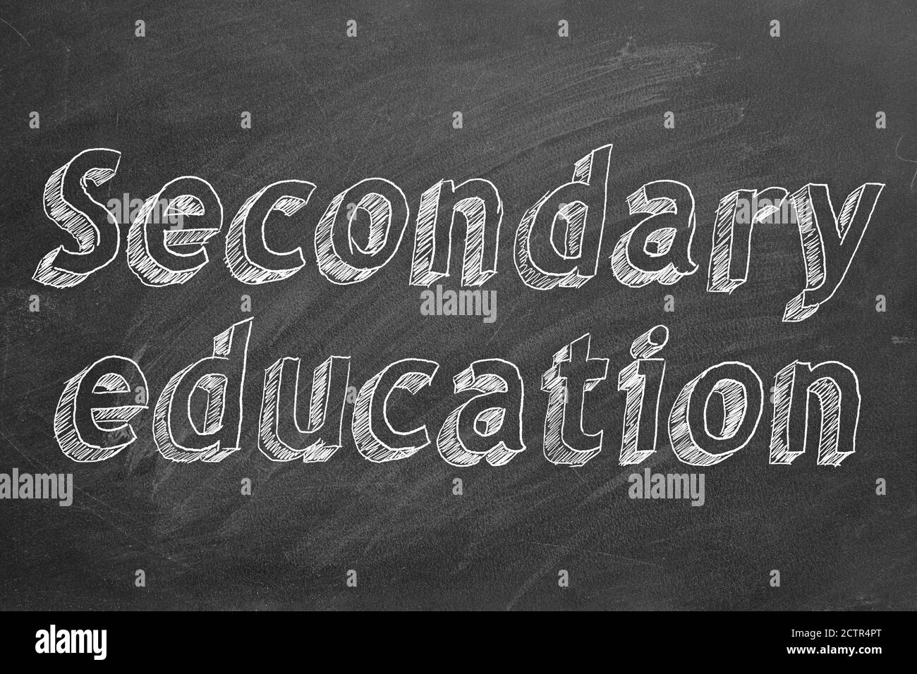 Hand drawing 'Secondary education' on black chalkboard Stock Photo