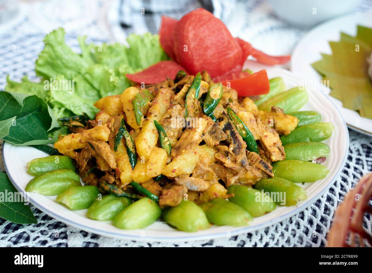 Smoked dry fish with spicy seasoning. Asian Traditional seafood menu