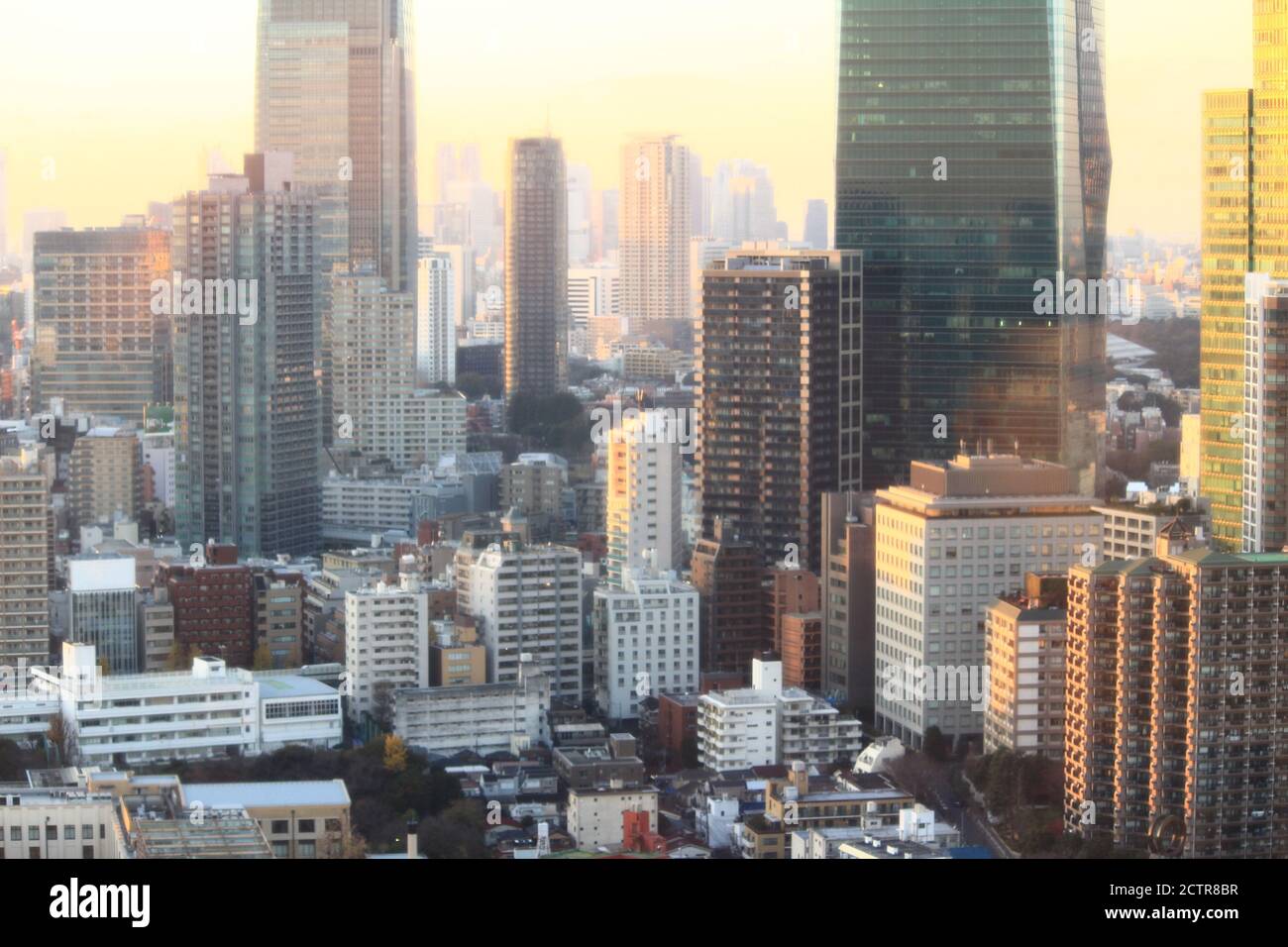 Tokyo cityscape shining in the pale orange sunlight Stock Photo