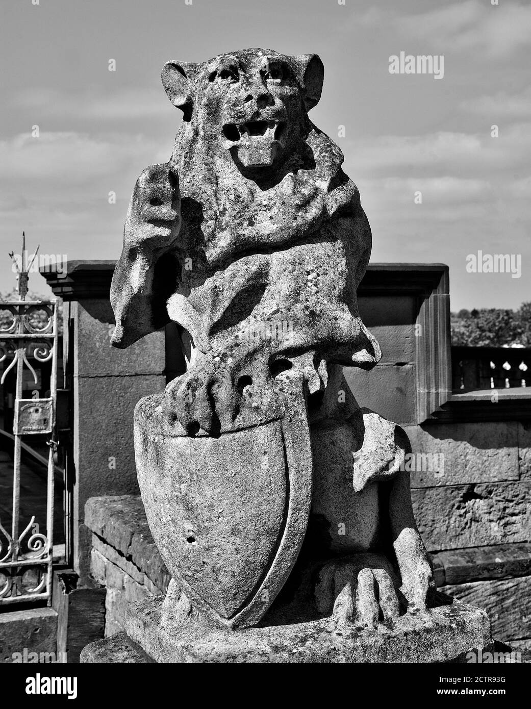 Old worn stone lion statue Stock Photo