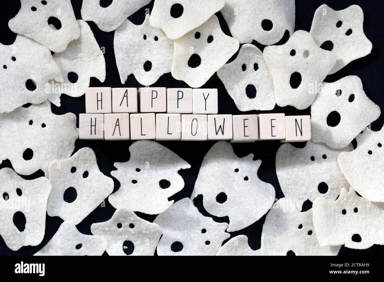 Words Happy Halloween With Various Ghost On Black Background Top View words-happy-halloween-with-various-ghost-on-black-background-top-view