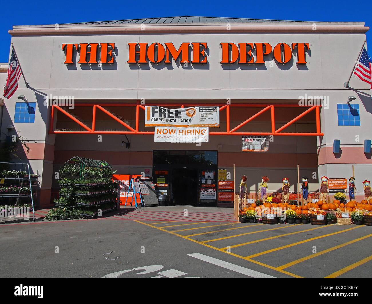 Home Depot store with a 'now hiring' banner' in California Stock Photo