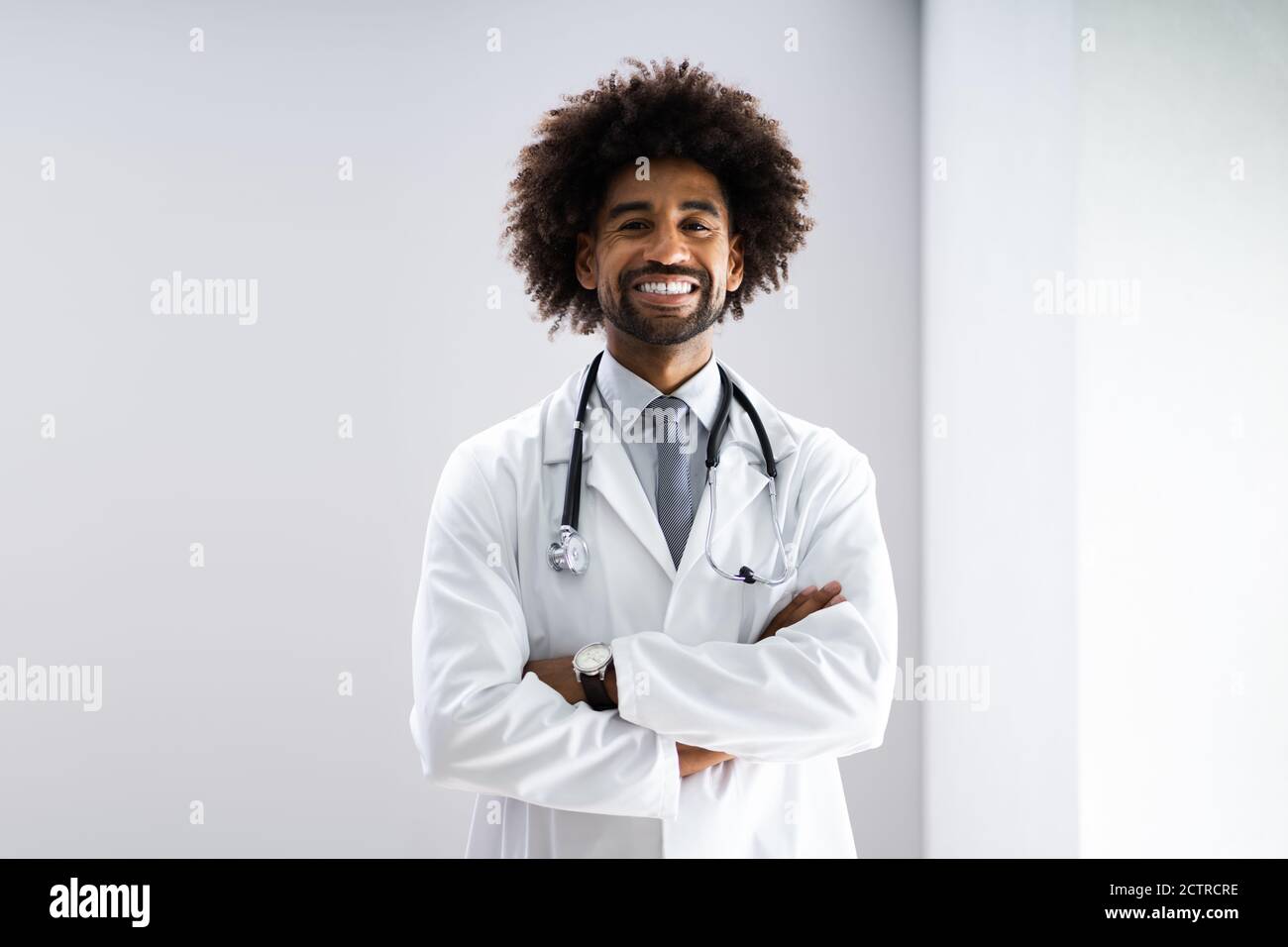African American Doctor With Stethoscope At Healthcare Lab Stock Photo