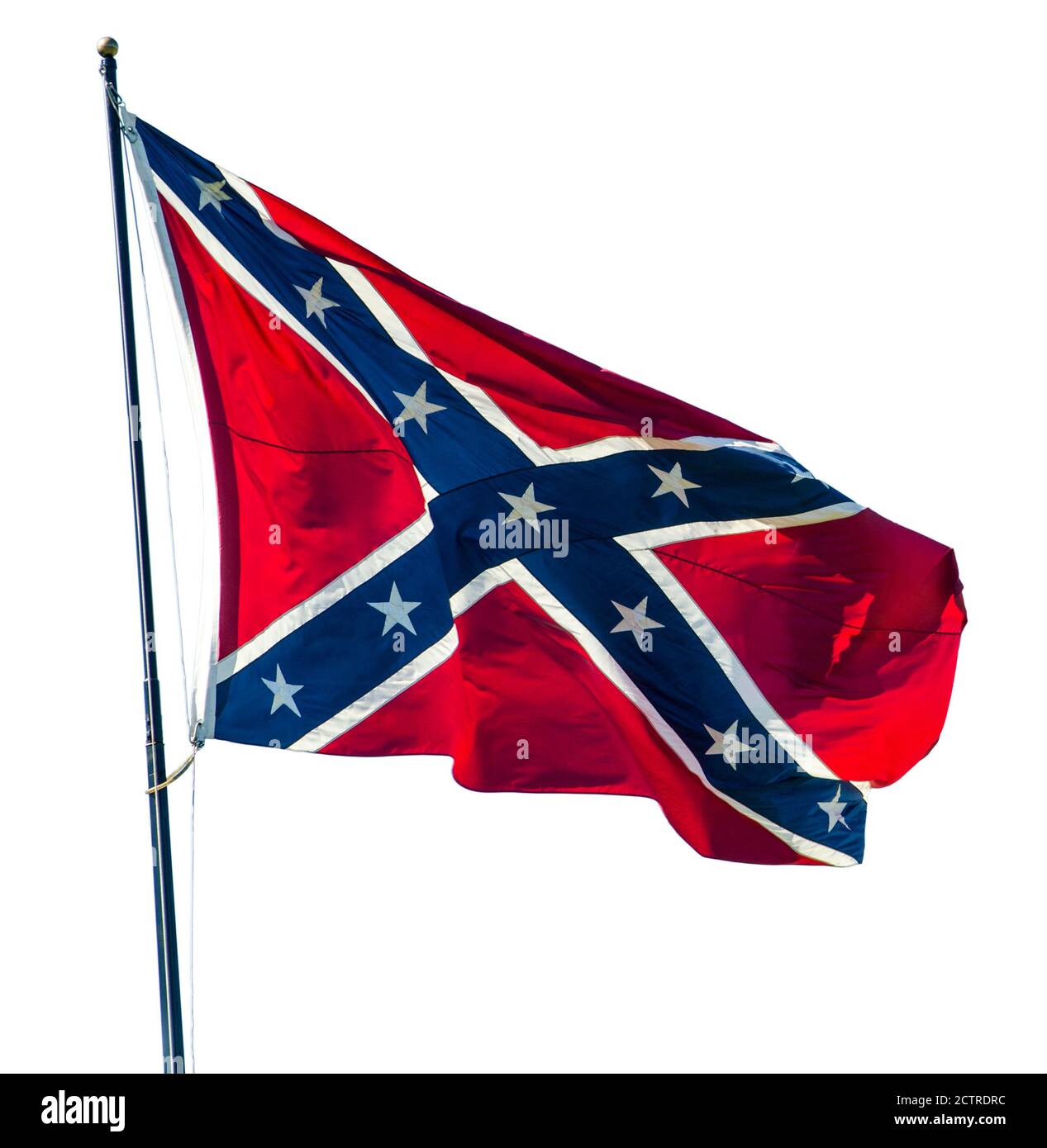 Spectacular Sunrise behind a Confederate Flag Blowing in the Wind against a Sunrise sky Stock Photo