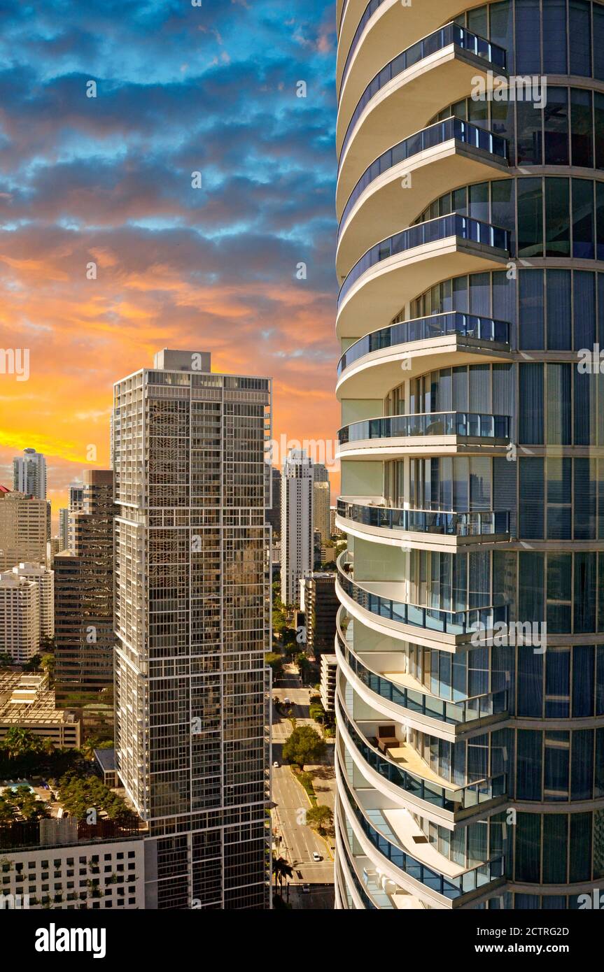 Picture of Breathtaking Sunrise behind High Rise Buildings Create an Urban ...