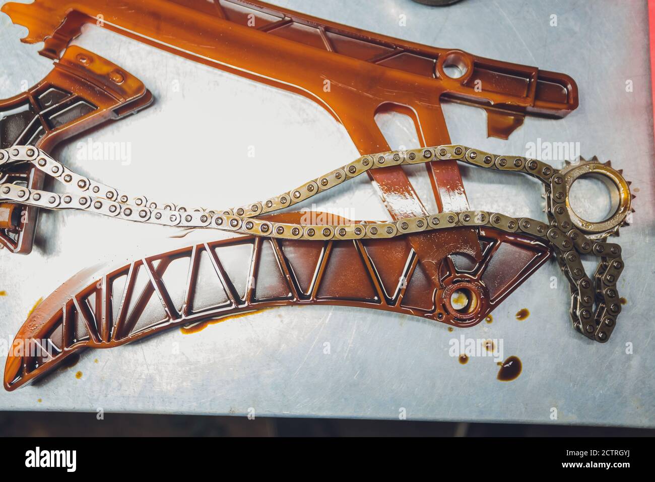 The iron gearbox of a car s transmission disassembly of the transmission chain and parts, repair