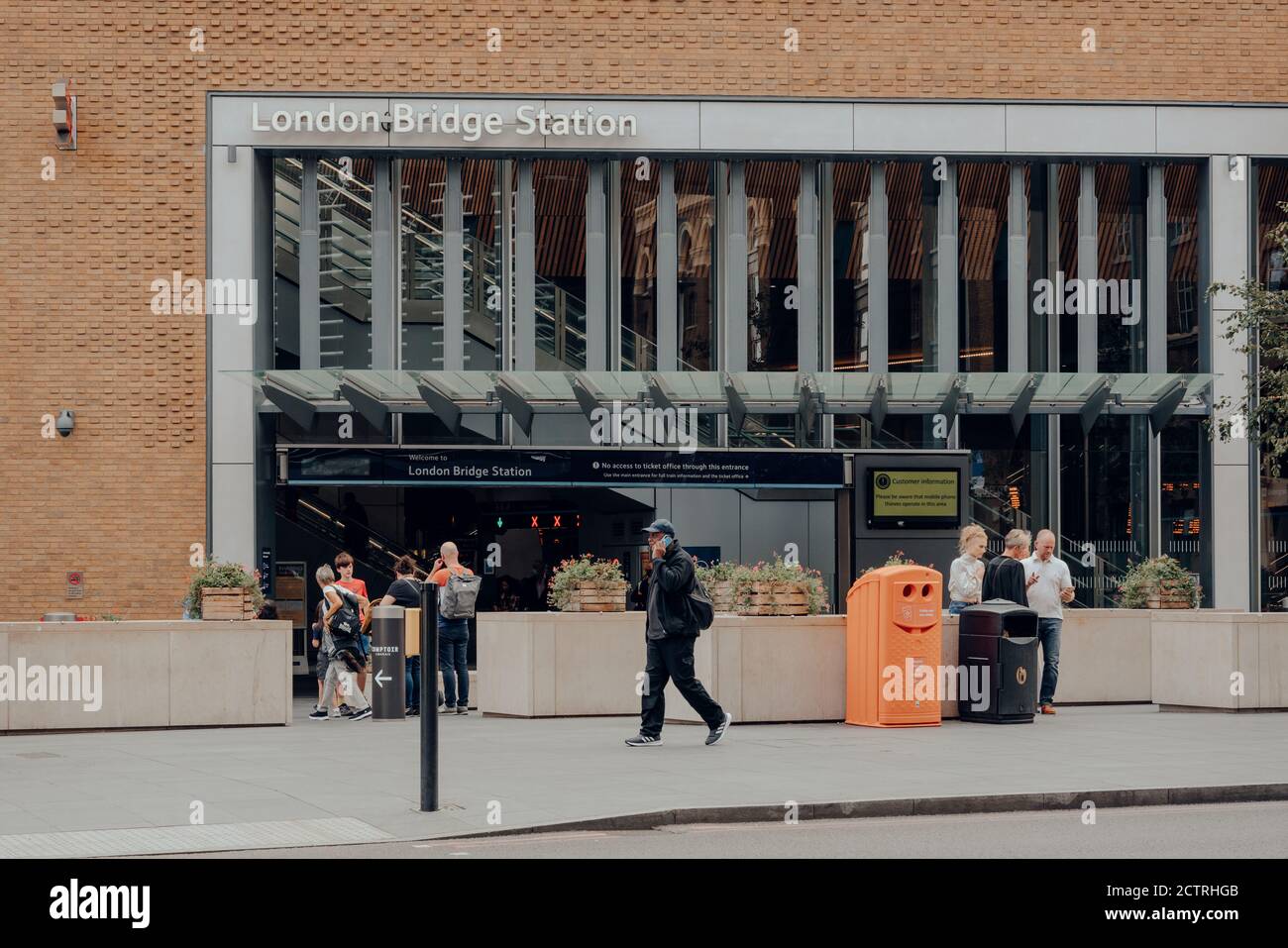 London Bridge Railing London, UK - August 25, 2020: People walking in front on London Bridge ...