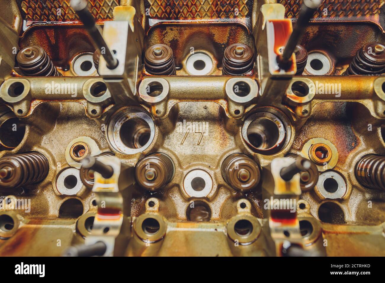 The iron gearbox of a car s transmission disassembly of the transmission chain and parts, repair