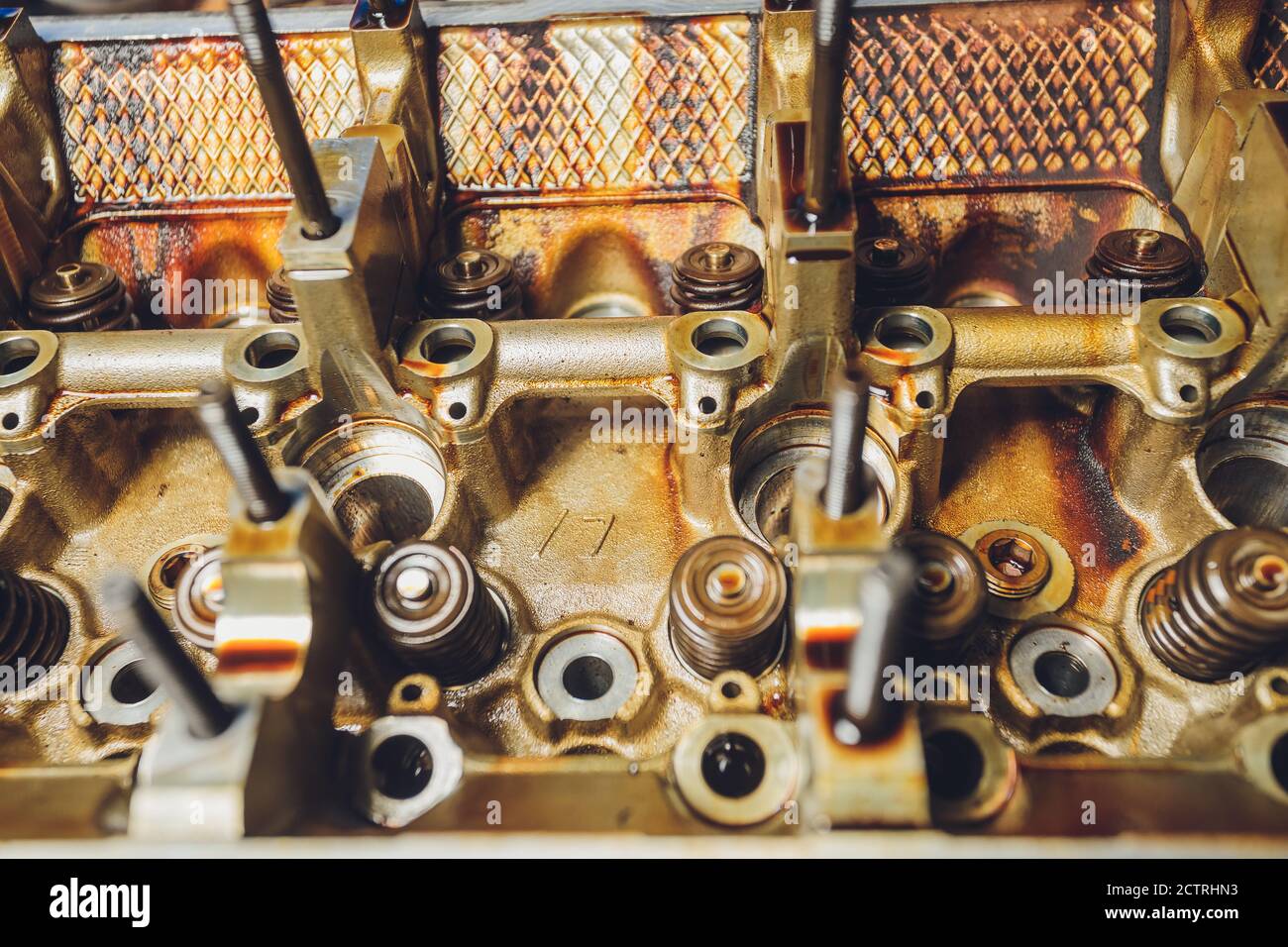 The iron gearbox of a car s transmission disassembly of the transmission chain and parts, repair