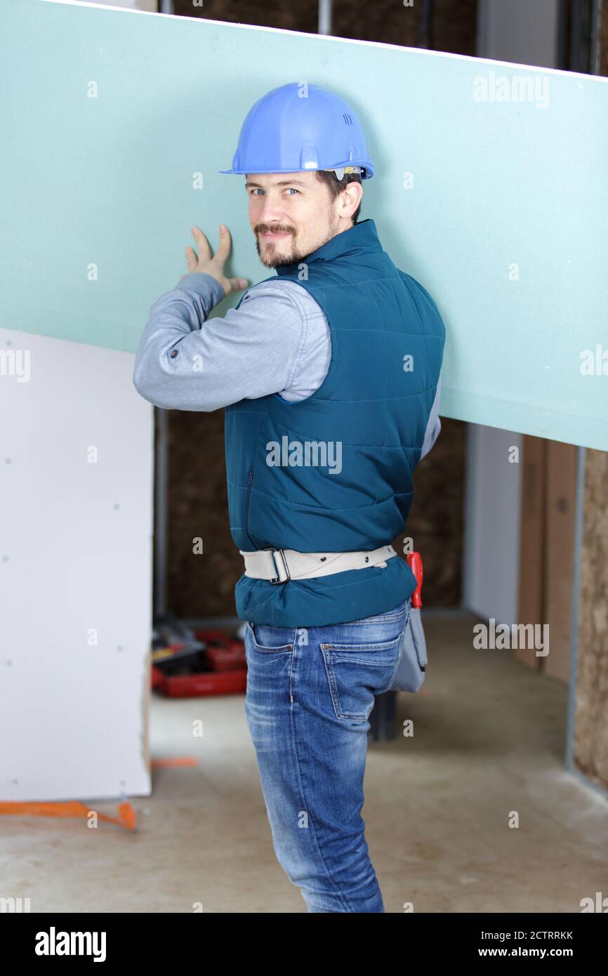 construction worker happy holding something Stock Photo - Alamy
