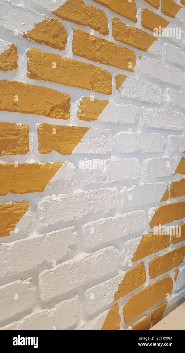 Yellow and white striped wall Stock Photo Alamy