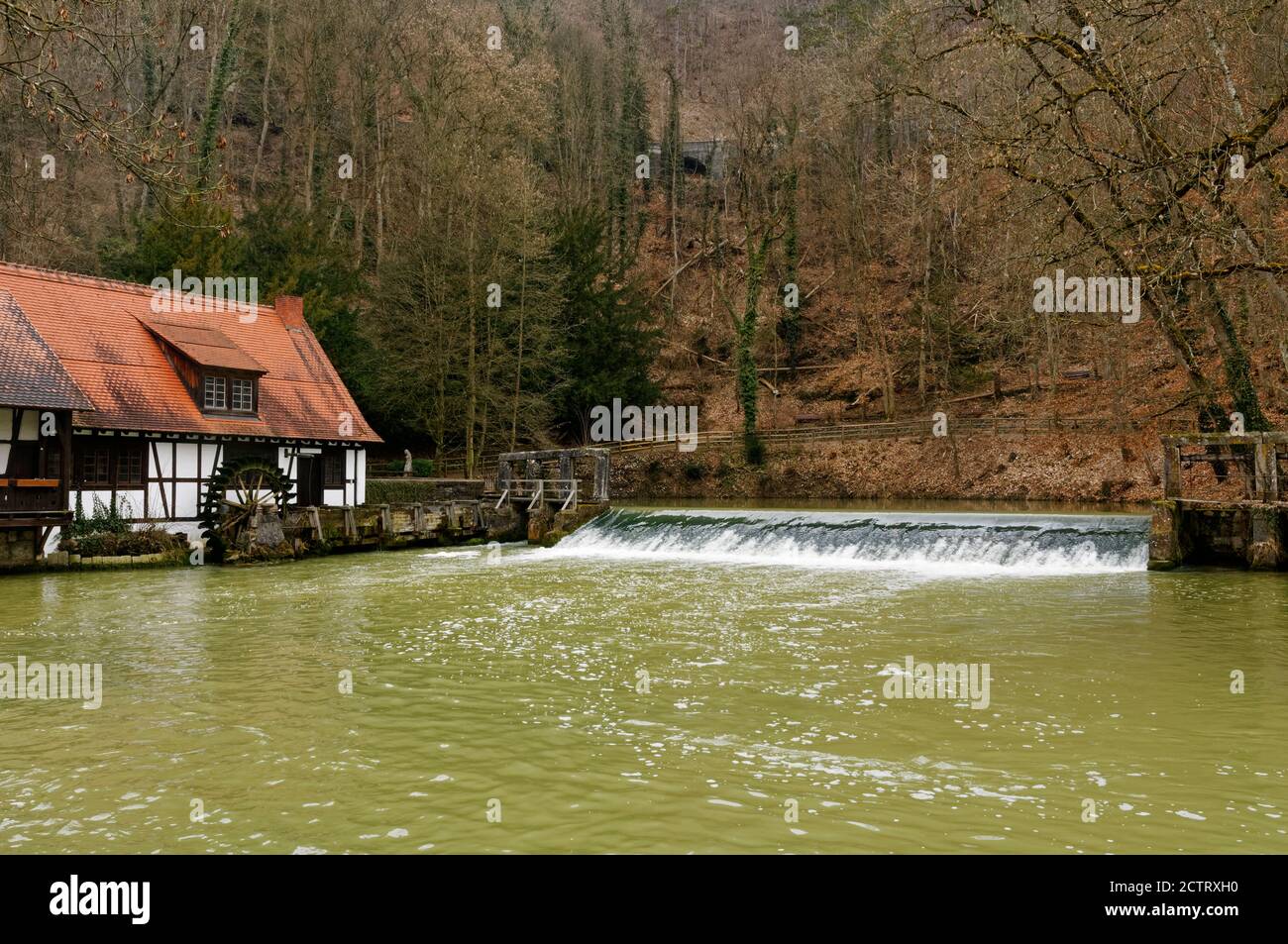 Blaubeuren: historic hammer mill at the Blautopf, Alb-Donau District, Baden-Wuerttemberg, Germany Stock Photo