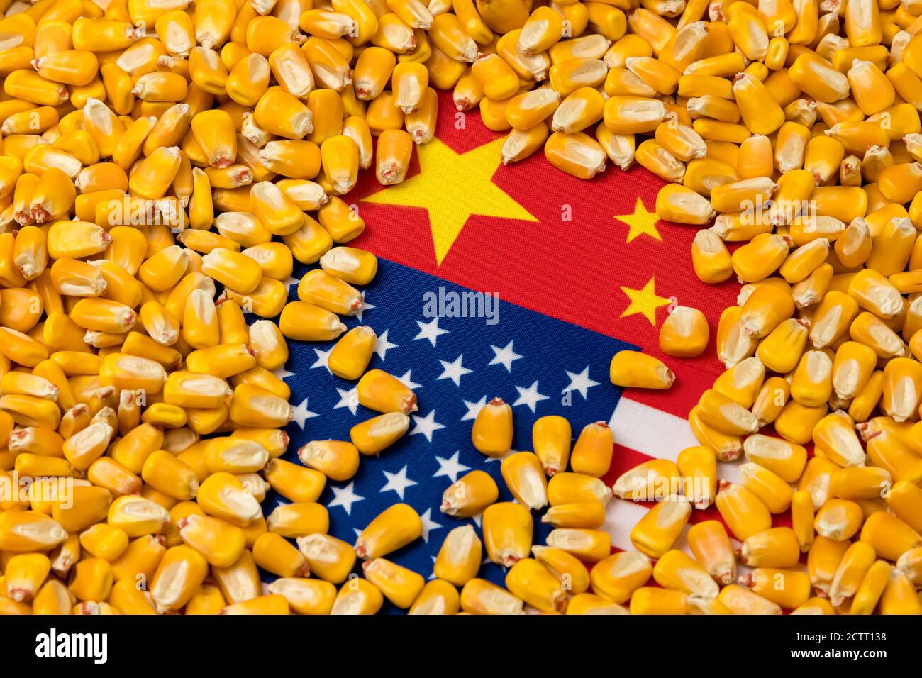 Flags of China and United States of America covered in corn kernels. Concept of Chinese and American agriculture imports, exports, trade war agreement Stock Photo