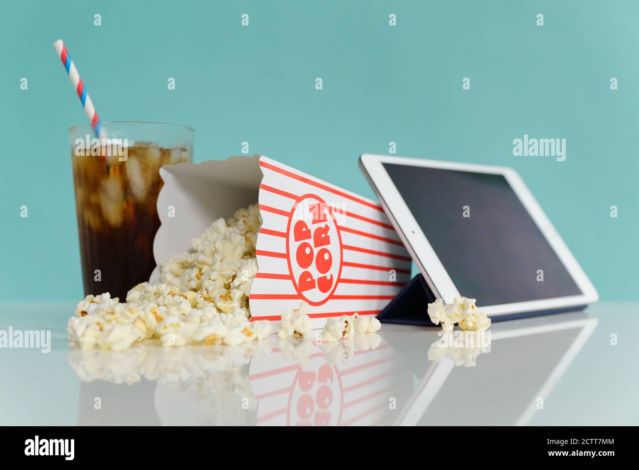 Studio shot of popcorn with digital tablet and soda Stock Photo