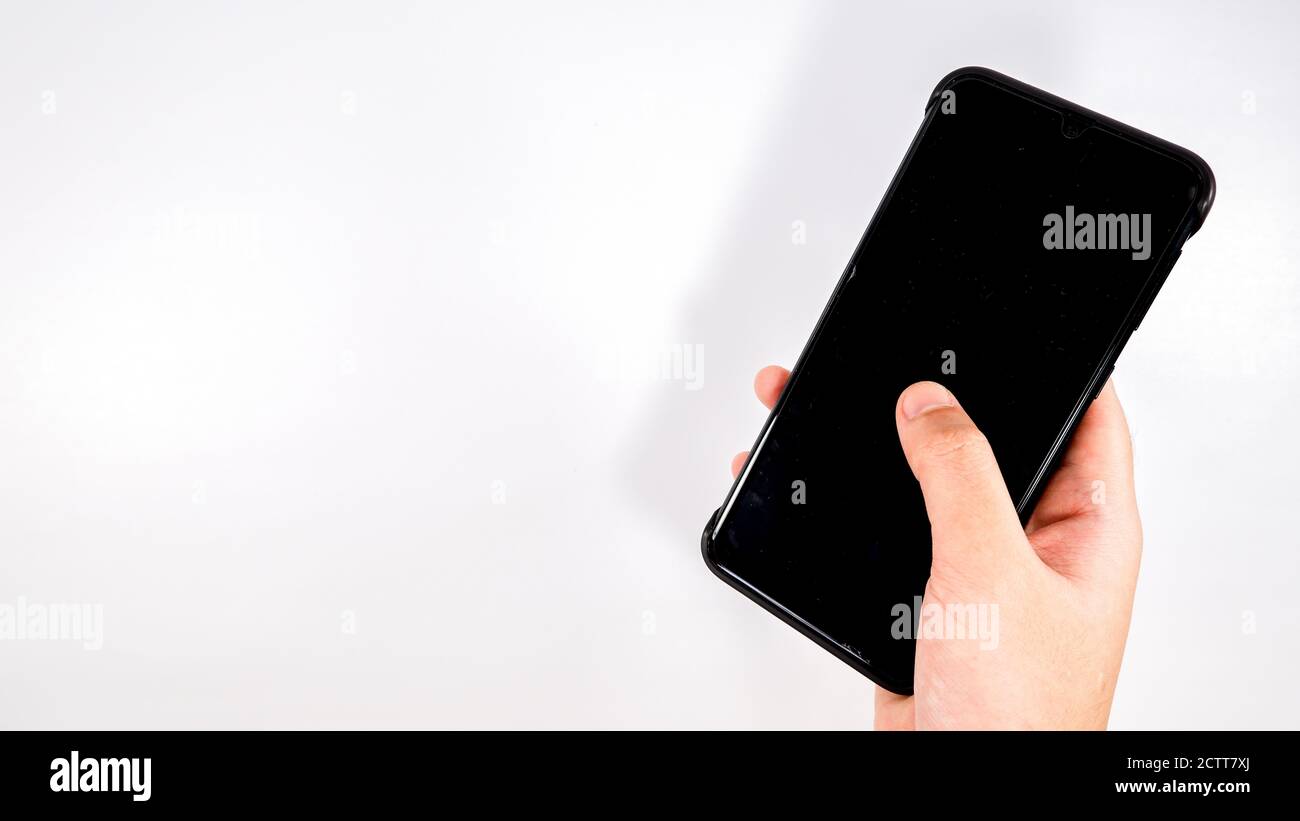 Hand holding phone cut out hi-res stock photography and images - Alamy