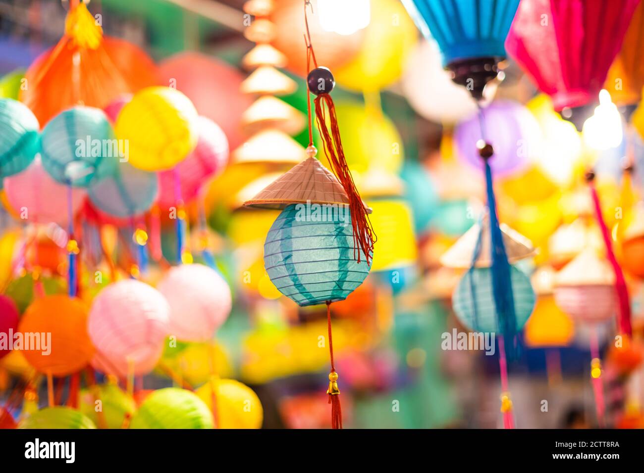Decorated colorful lanterns hanging on a stand in the streets of Cholon in  Ho Chi Minh City, Vietnam during Mid Autumn Festival. Chinese language in p  Stock Photo - Alamy