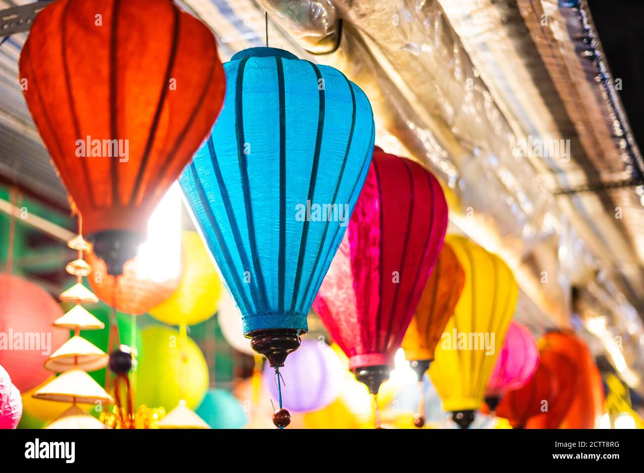 Decorated colorful lanterns hanging on a stand in the streets of Cholon ...