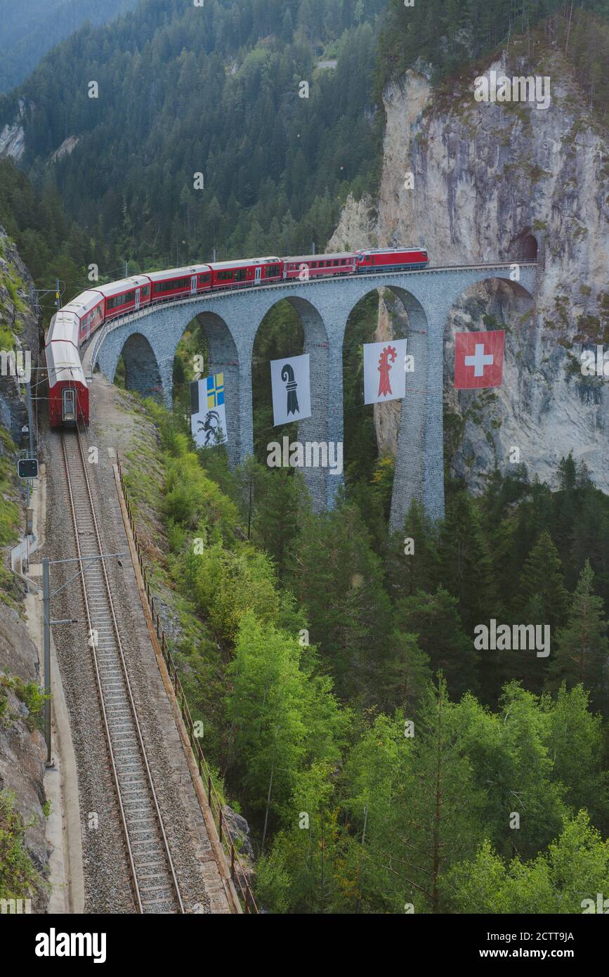 Switzerland, Schmitten and Filisur Landwasser Viaduct, Train on bridge in mountains Stock Photo