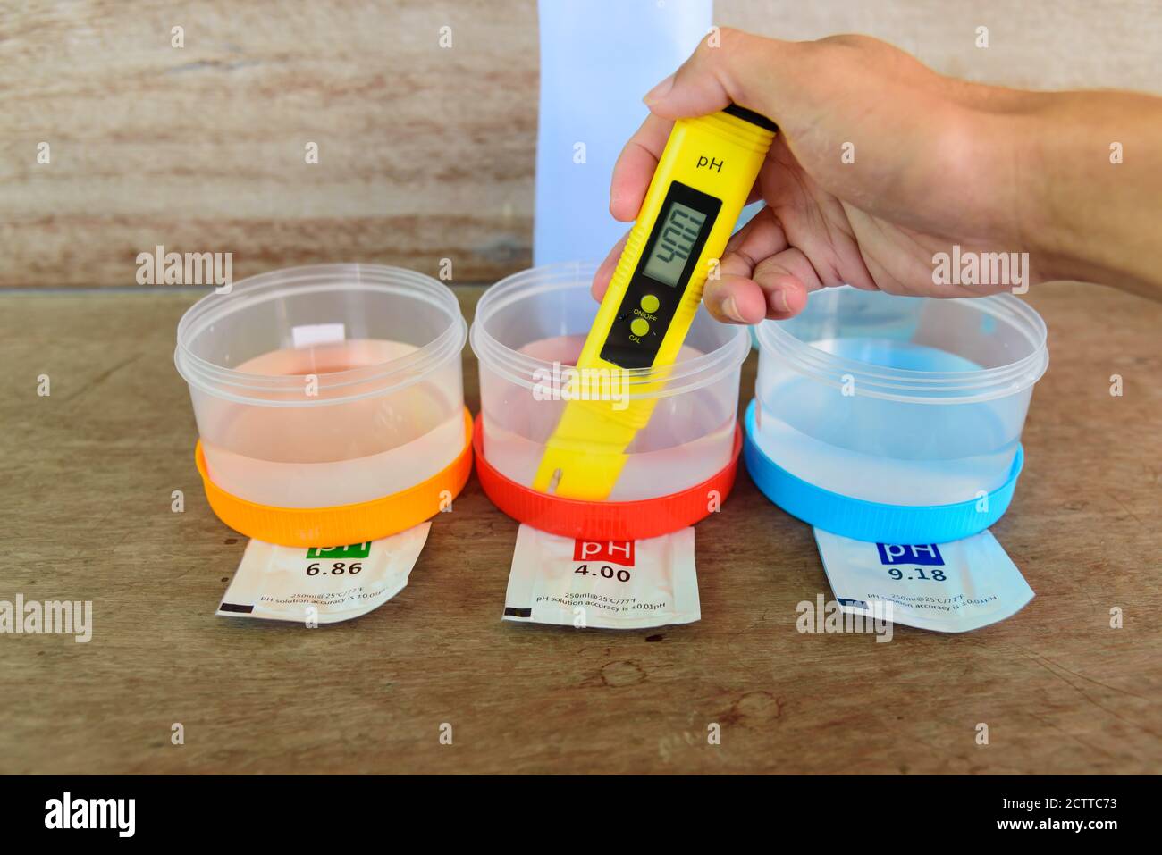 The man calibrate Ph meter before use it for tester Stock Photo Alamy