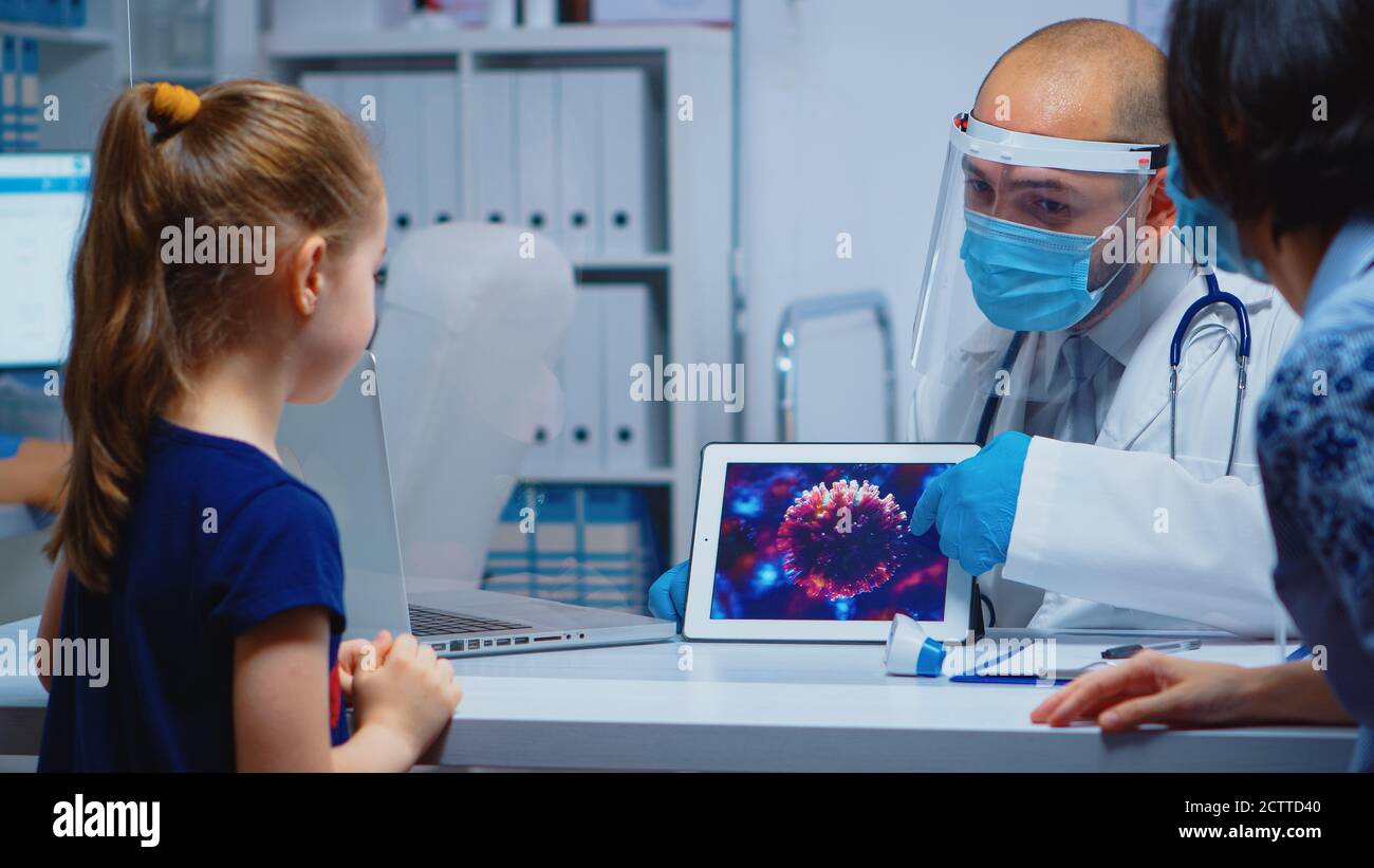 Doctor explaining evolution virus hi-res stock photography and images ...