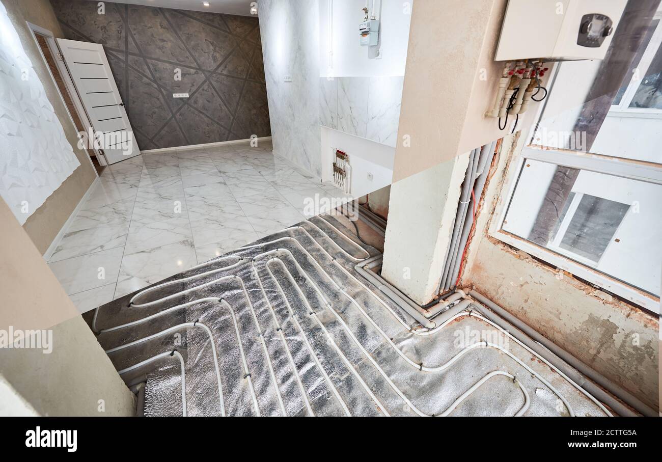 Comparison of new renovated apartment with marble floor and old place with underfloor heating pipes. Modern apartment room before and after refurbishment. Concept of home renovation. Stock Photo