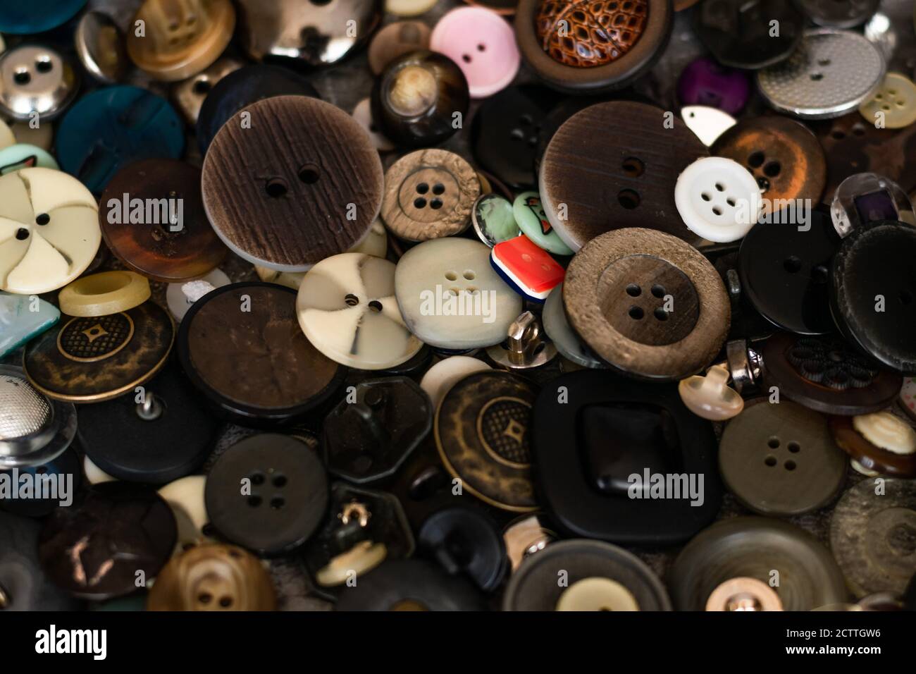 Close-up view of many buttons, sewing items Stock Photo