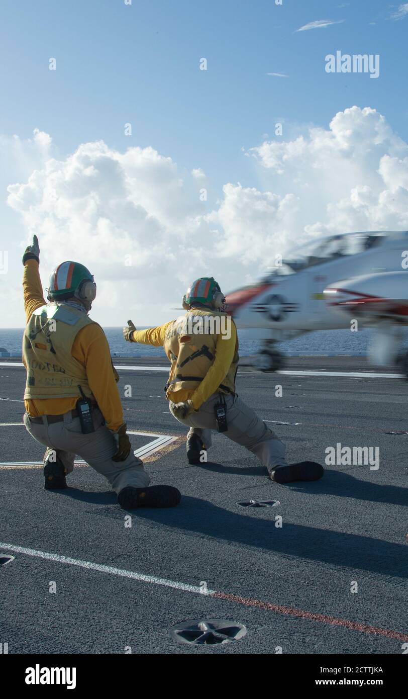 A T-45C Goshawk, attached to Training Air Wing 2, launches from USS Gerald R. Ford's (CVN 78) flight deck Sept. 11, 2020. Ford is underway in the Atlantic Ocean conducting carrier qualifications. (U.S. Navy photo by Mass Communication Specialist Seaman Apprentice Sarah Mead) Stock Photo
