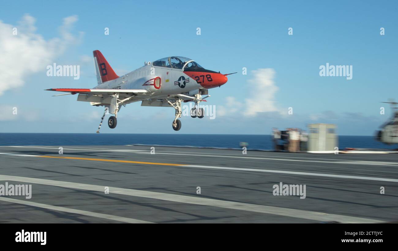 A T-45C Goshawk, attached to Training Air Wing 2, approaches USS Gerald R. Ford's (CVN 78) flight deck Sept. 11, 2020. Ford is underway in the Atlantic Ocean conducting carrier qualifications. (U.S. Navy photo by Mass Communication Specialist Seaman Apprentice Sarah Mead) Stock Photo