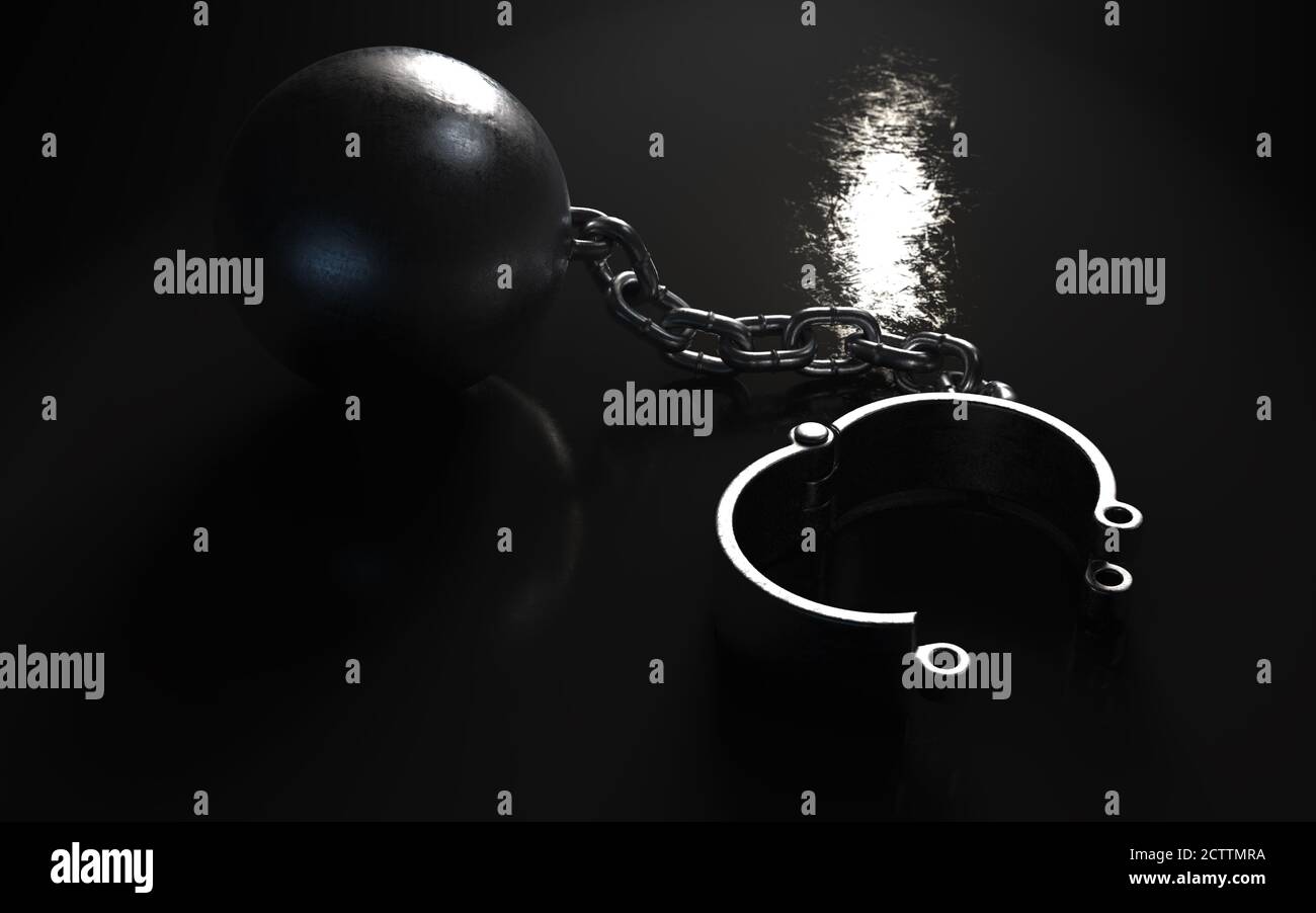 A heavy metal ball and chain with an opened shackle on an isolated dark  background lit by a spotlight - 3D render Stock Photo - Alamy