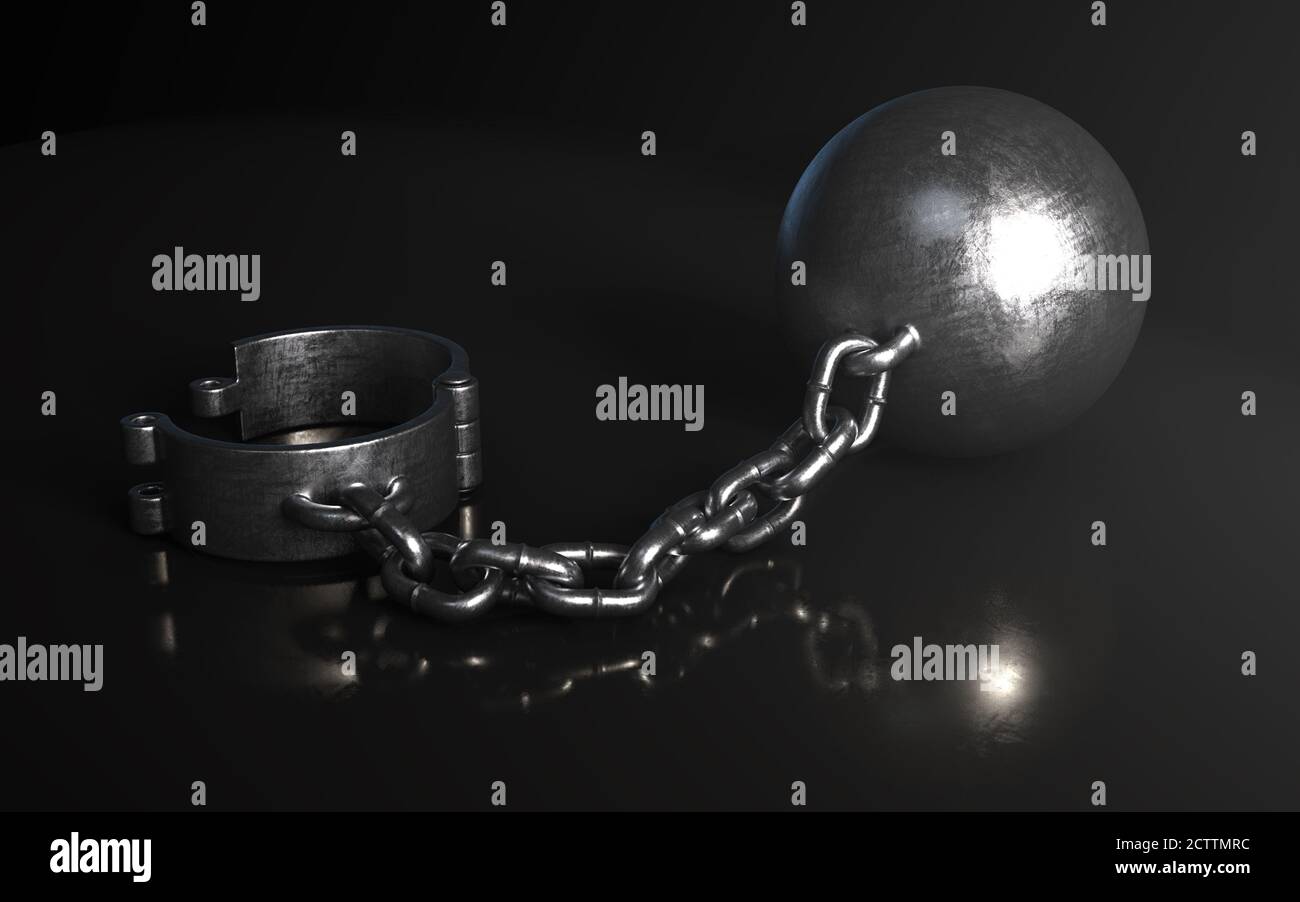 A heavy metal ball and chain with an opened shackle on an isolated dark