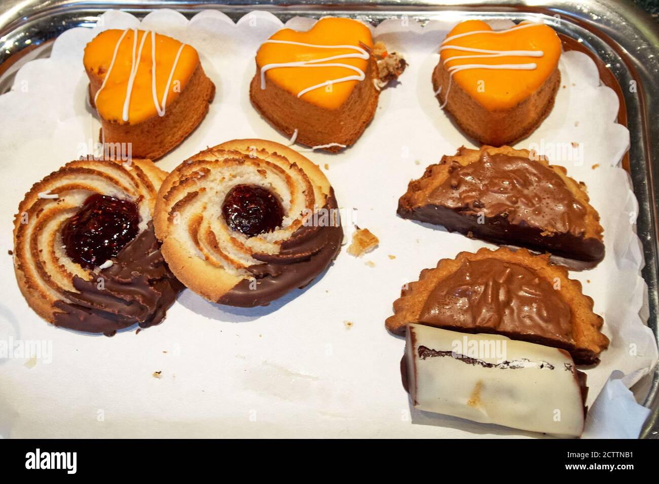 Various small cakes on a tray Stock Photo