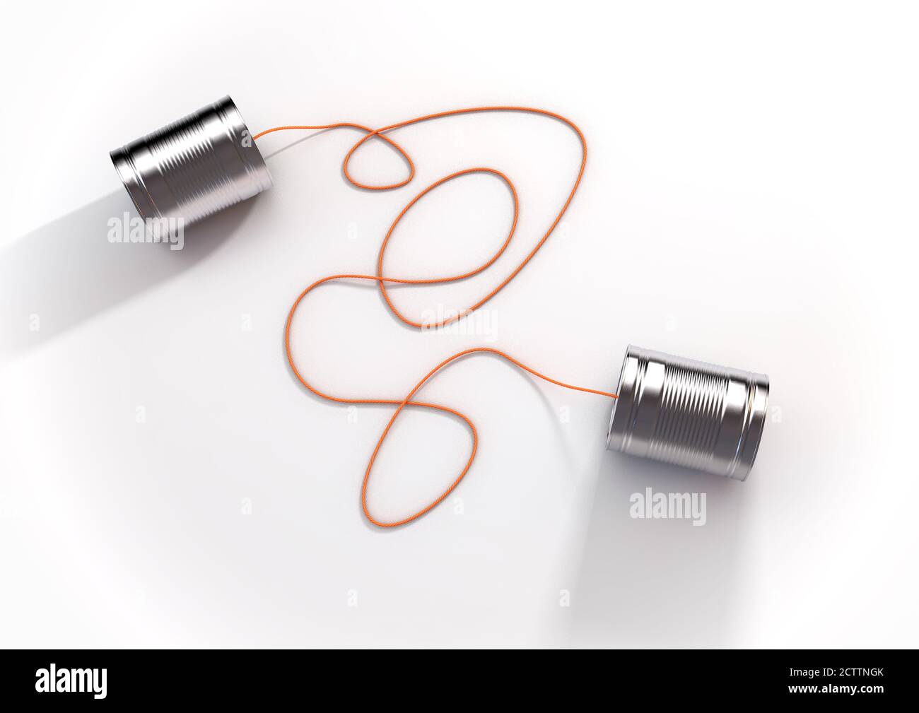 A pair of homemade toy telephones made from empty tin cans and connected wth a string on an isolated white background - 3D render Stock Photo