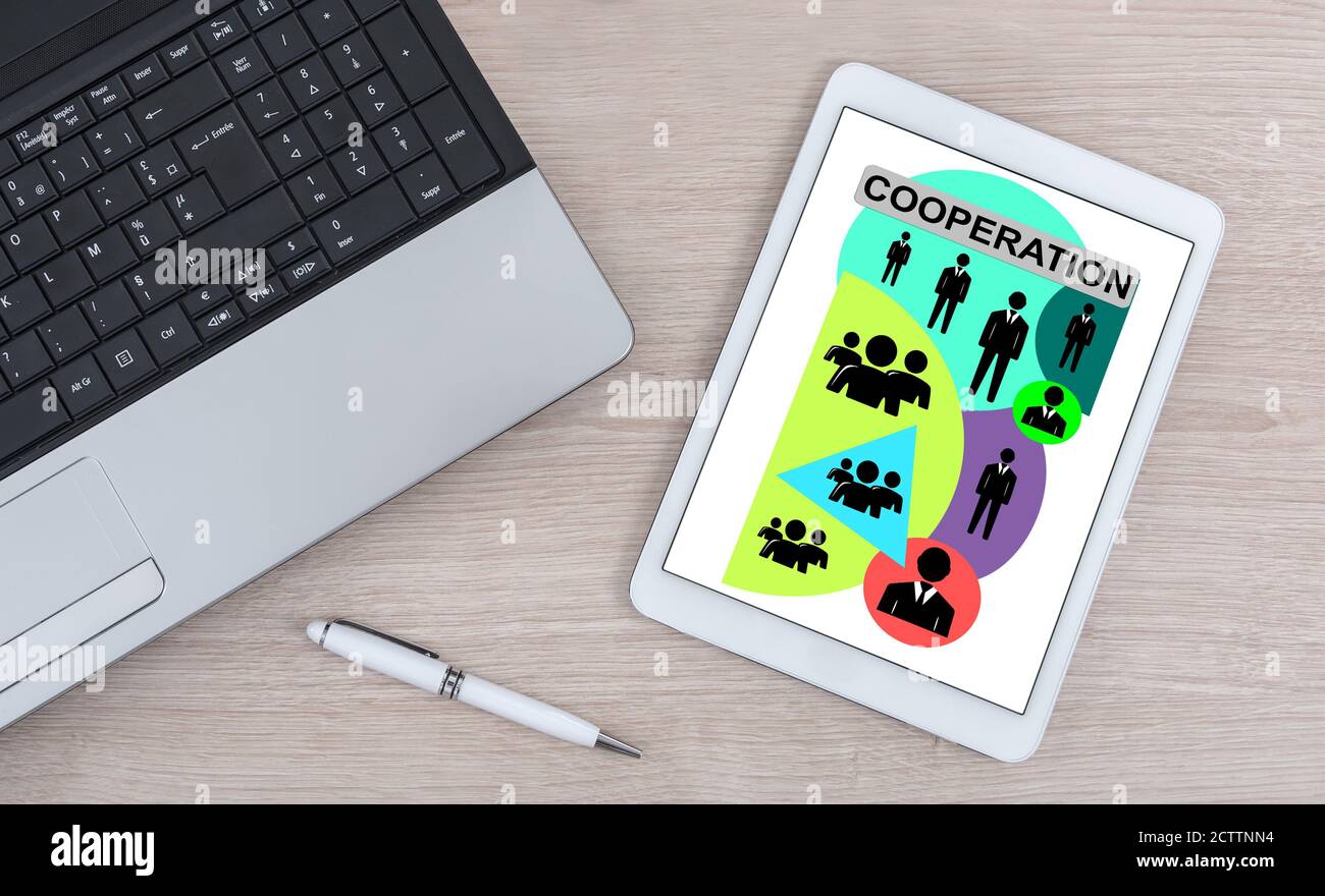 Cooperation concept shown on a digital tablet Stock Photo