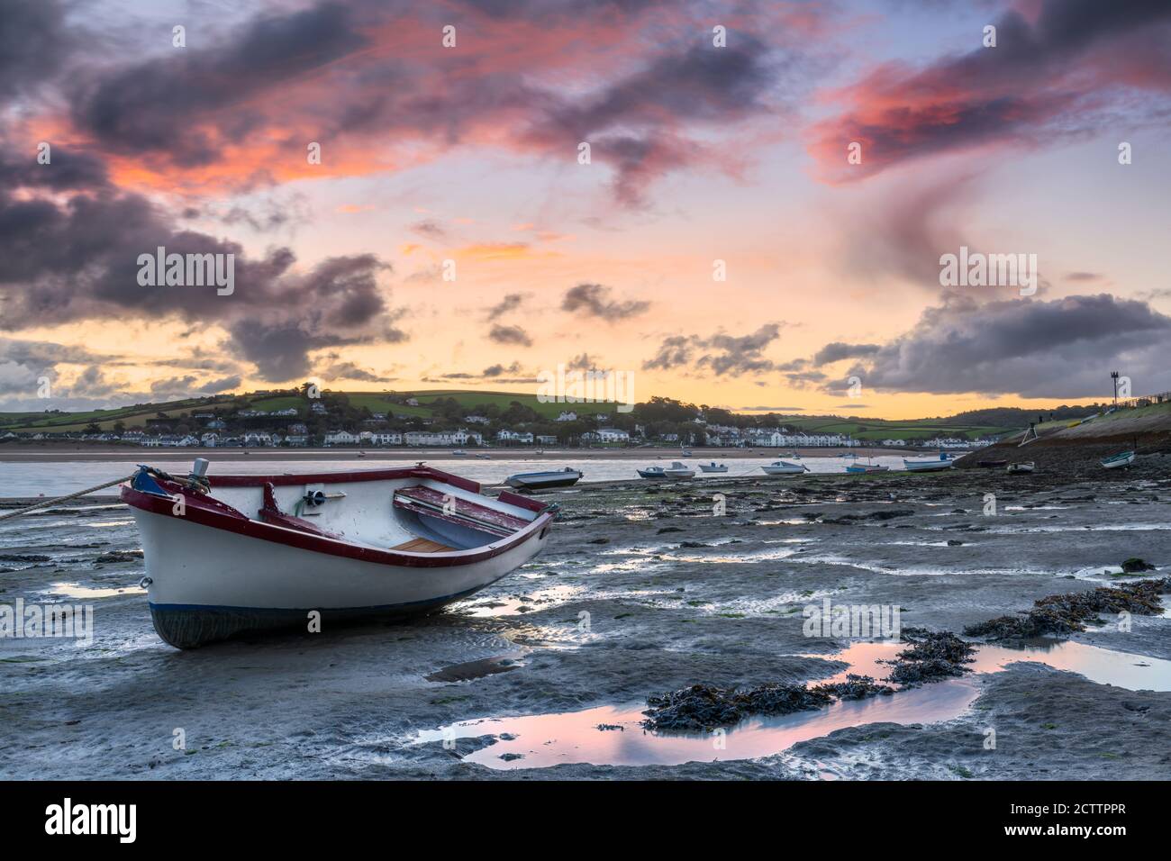 Appledore, North Devon, England. Friday 25th September 2020. UK Weather. After a night of heavy downpours and strong winds, at dawn the remnants of yet another heavy shower passes over the Torridge estuary at the small North Devon coastal vilage of Appledore. Credit: Terry Mathews/Alamy Live News Stock Photo