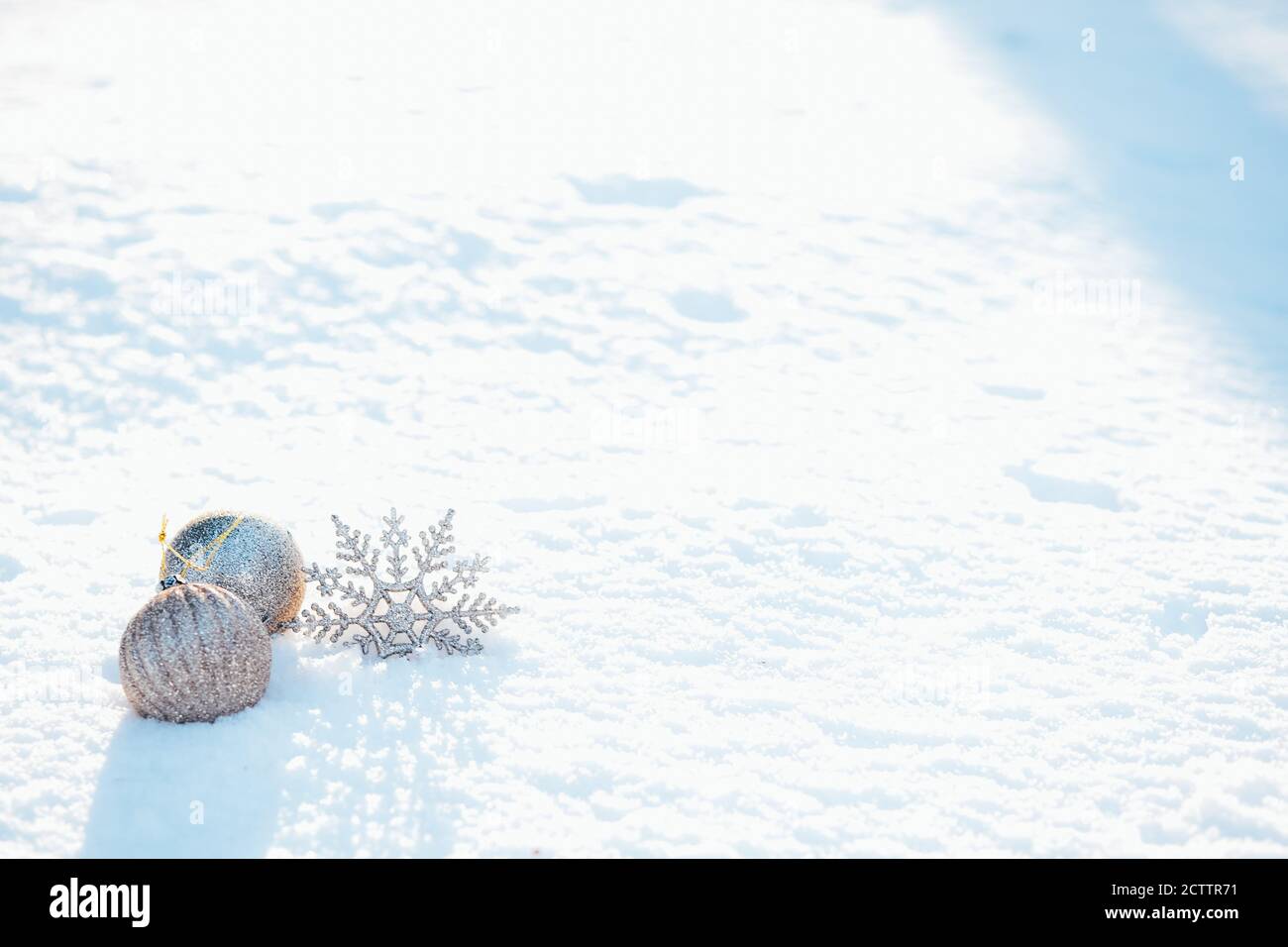 Silver Christmas balls in natural snow background. Copy paste Stock ...