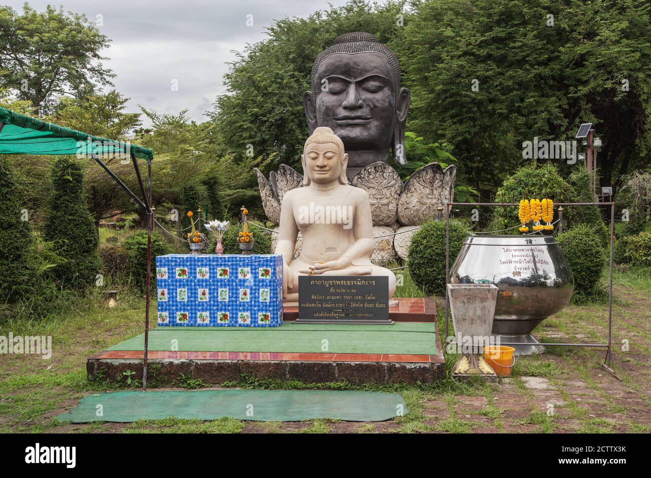 Black Buddha Head in Wat Thammikarat, Ayutthaya, Thailand. Stock Photo