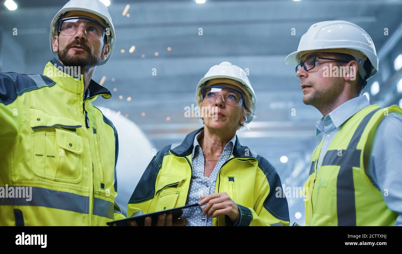 Diverse group three professional engineers hi-res stock photography and ...