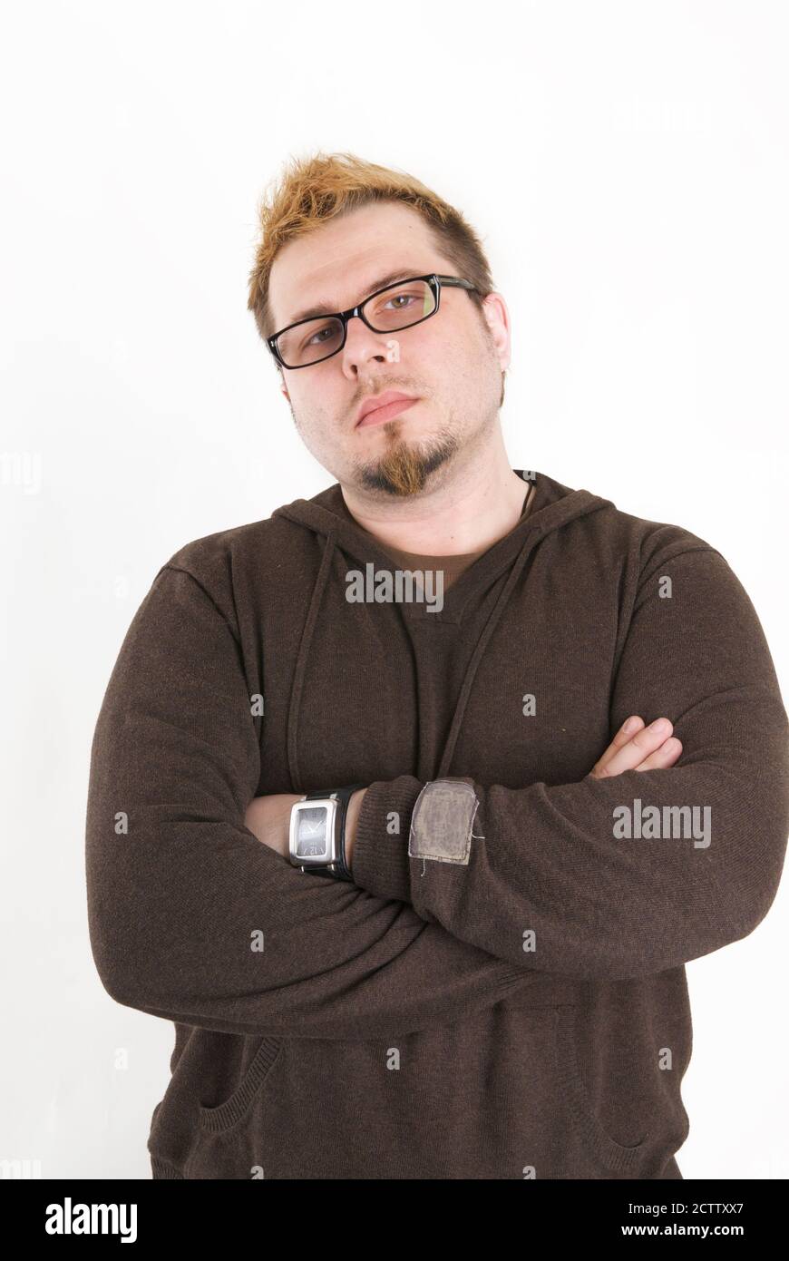Man with glasses and brown sweatshirt Stock Photo