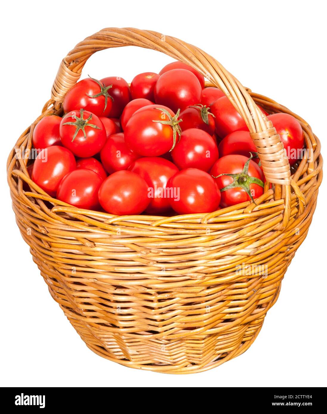 Tomatoes in a basket on a white background Stock Photo - Alamy