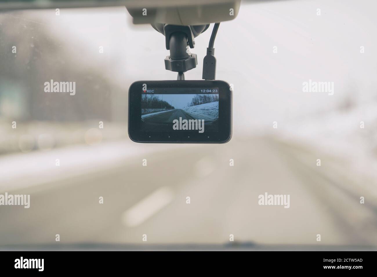 Using dashboard camera to continuously record a view through a vehicle