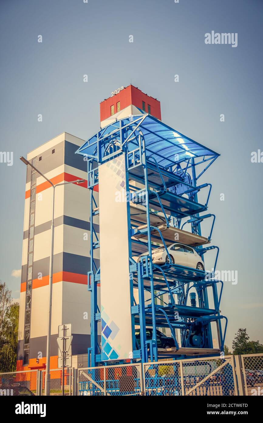 Vertical automated car Parking system on the street. Automatic multi
