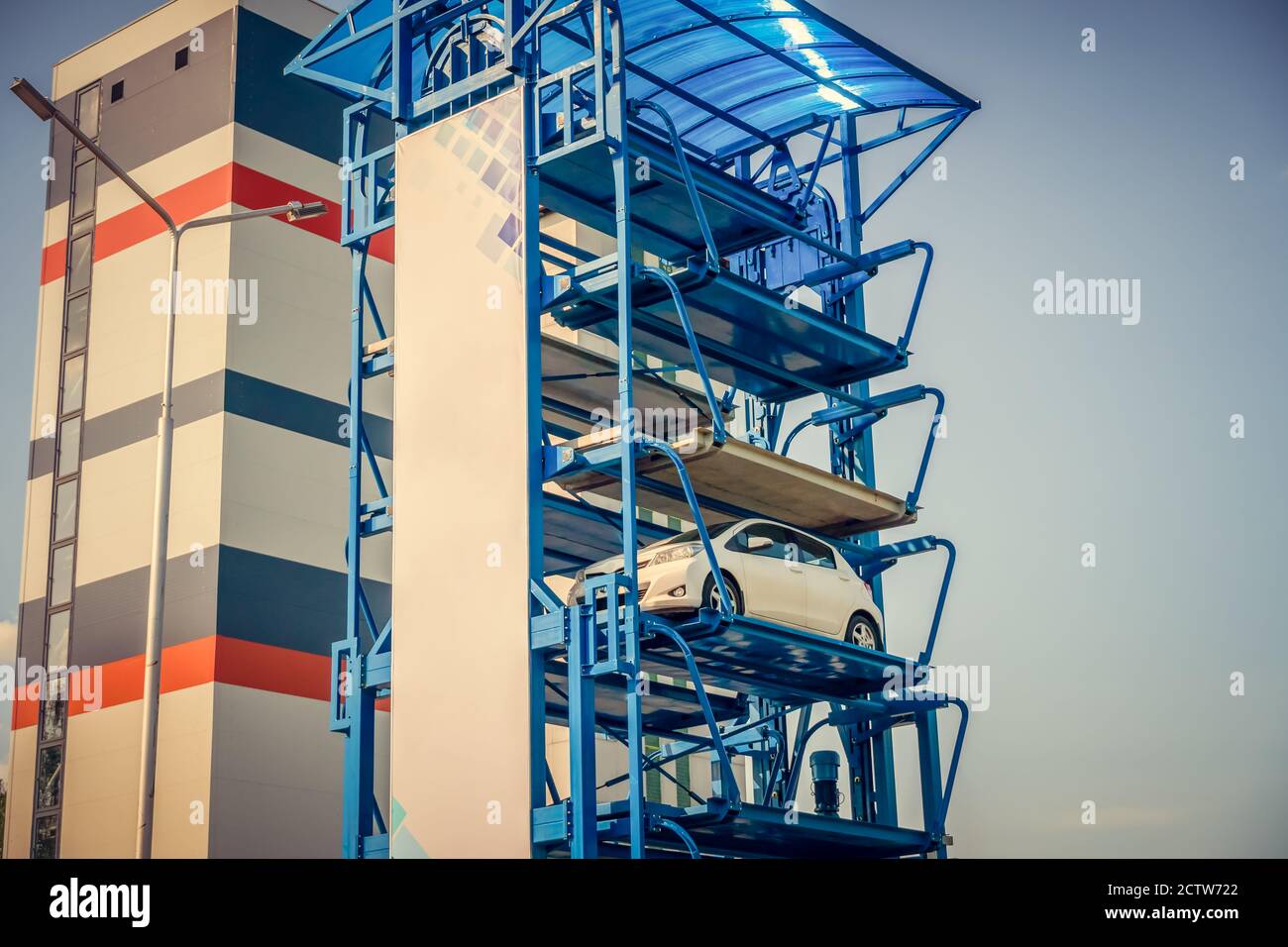 Vertical automated car Parking system on the street. Automatic multi